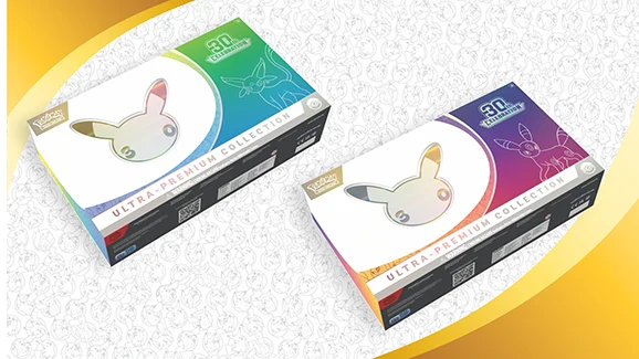 The two 30th Celebration Ultra-Premium Collection boxes, Day with a green and blue lid and an Espeon outline, Night with a purple lid and an Umbreon outline